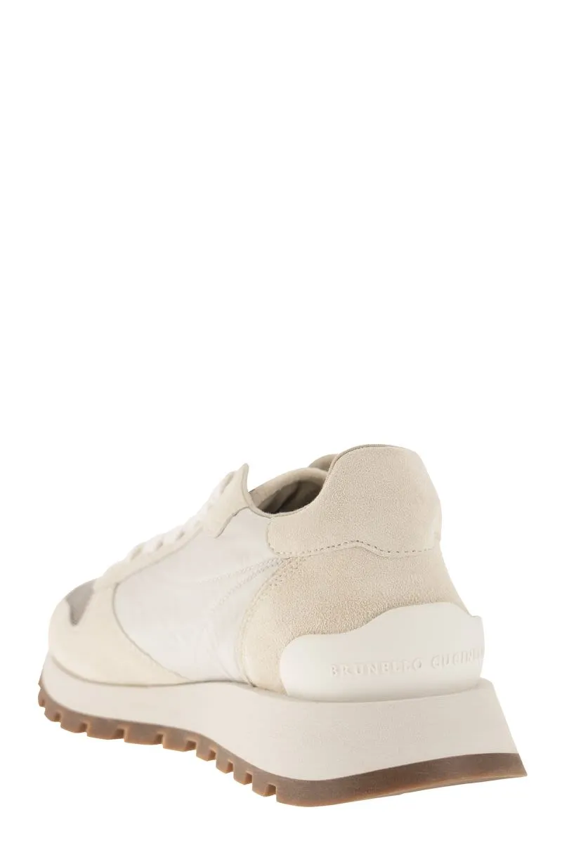 COLOR-BLOCK PANELLED LEATHER SNEAKERS